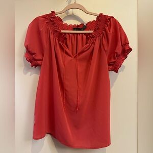 Outback red medium top in a coral red color
